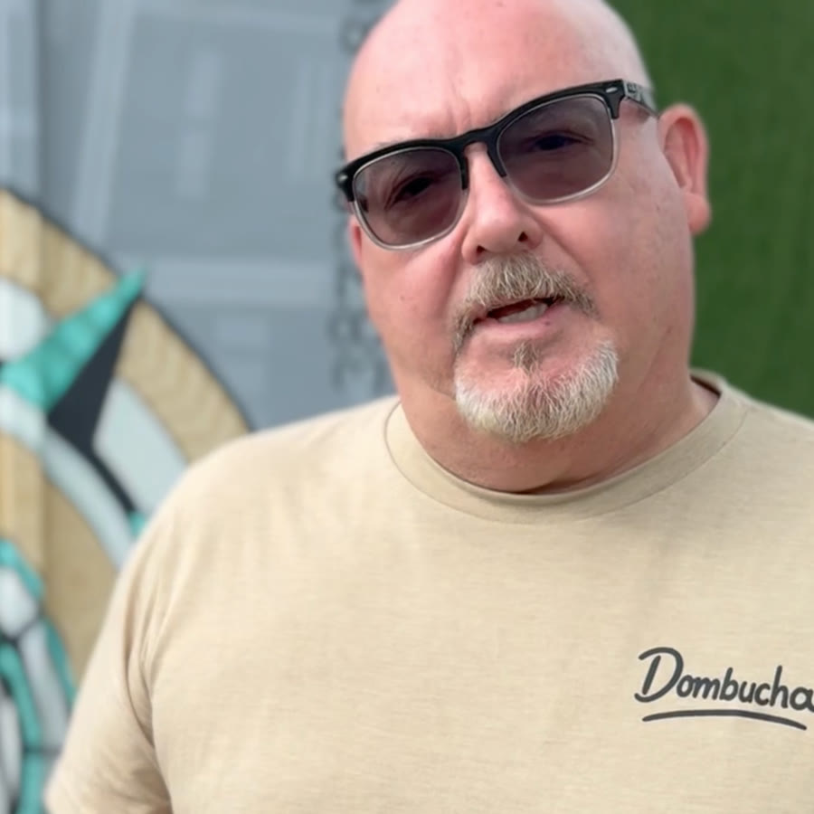 Dom Peri, owner of Prosperity Brewery, in front of his brewery